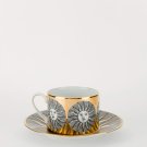 tea-cup-sole-gold-black-white-2